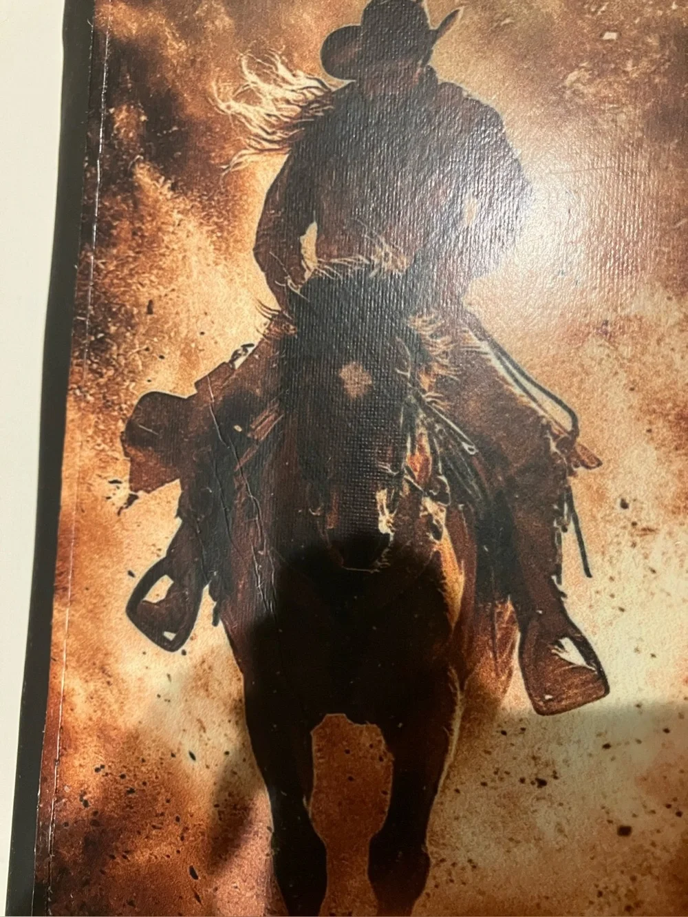 Western-themed zip-around wallet cowboy riding horse sunset